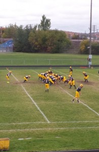 The Negaunee Miners warm-up on the field before their game against the Norway Knights at home in Negaunee on Friday, October 4, 2013. 