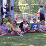 Spectators in the shade at Community Day in Marquette Township.