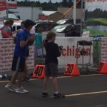 These two gentlemen are having fun at the football toss