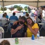 Happy community members enjoying a free meal at Honor Negaunee.