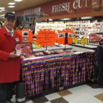 Pete displaying one of the many fine cuts of meat available at Super One Marquette