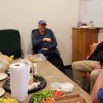 Mike sitting with some of the guys telling stories about his time at Great Lakes Radio.