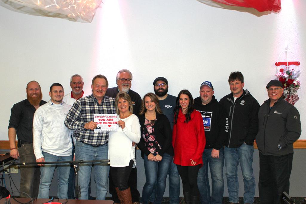 The Great Lakes Radio and Meyer Yamaha staff with giveaway winner, James Maki.