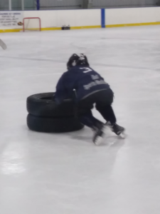 Holden in the midst of a hockey drill