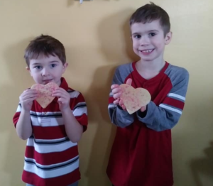 Kelsey's nephew, Titan, and her son, Holden, enjoying their Valentine's Day cookies!
