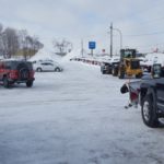 They needed some serious equipment to clear the lot after the snowstorm