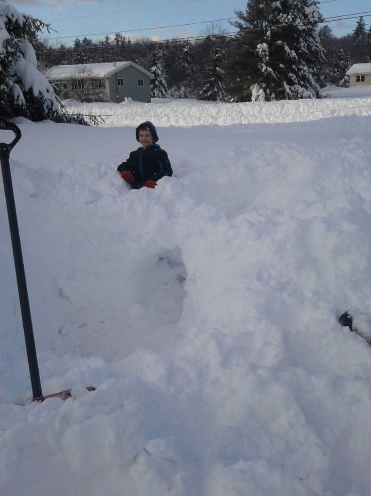 Holden Reyes on top of his snow fort!