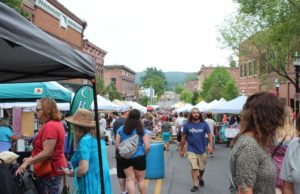 Crowd down Front Street during this year's Blueberry Festival