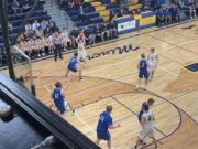 The Negaunee Miners Boys Basketball Team Travels to Face the Hancock Bulldogs Tonight on Sunny 101.9 Negaunee Moving the Ball