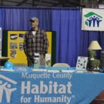 The booth for Marquette County Habitat for Humanity