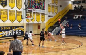 Negaunee Miners Defeat Gladstone Braves 55-27